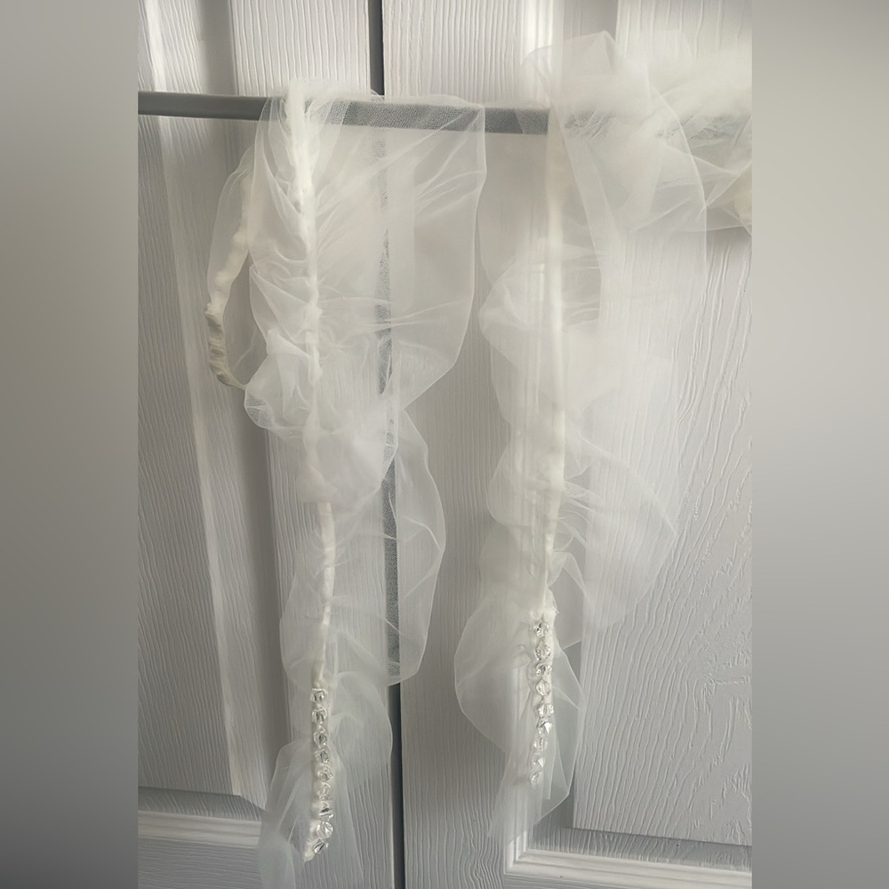 Bridal sleeves from Elegance by Roya. Sheer with diamond beaded details.